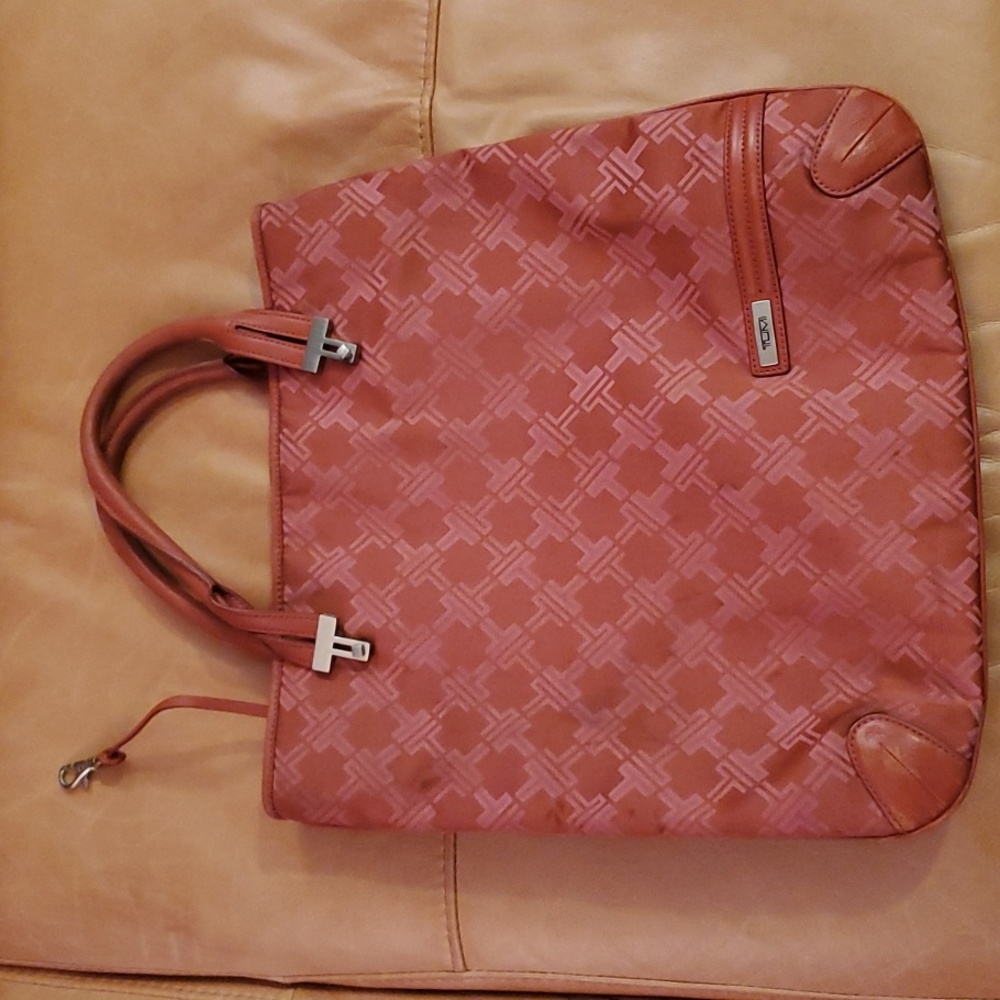 Tumi signature logo collection tote.